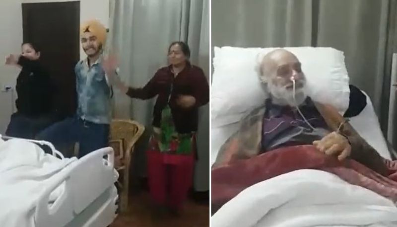 family members dancing for bedridden patient 