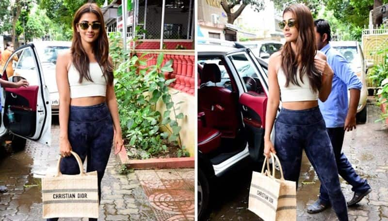 Pooja Hegde sets fashion goals in white crop top, blue joggers