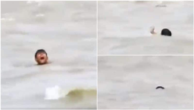 boy drowning in River full of crocodiles, great escape video