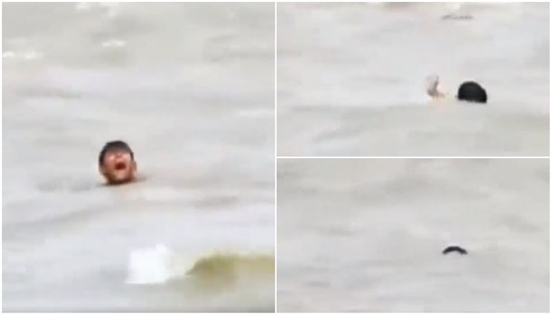 boy drowning in River full of crocodiles, great escape video