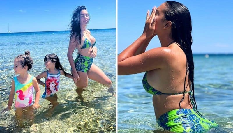 sexy pictures Cristiano Ronaldo partner Georgina Rodriguez flaunts curves in blue-green bikini on beach day out with kids snt