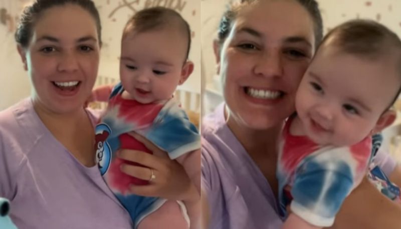 mom teaches five month old baby to take selfies