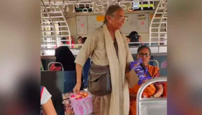 Elderly Woman Sells Chocolates On Train