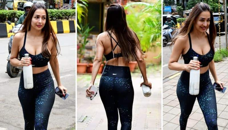 Malaika Arora looks SEXY in sports bra tight yoga pants flaunts cleavage midriff drb