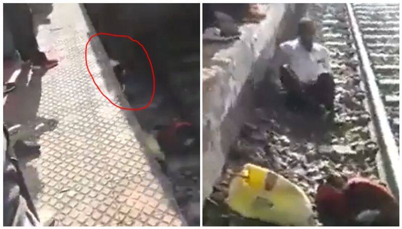 Man survives after train passes over him in shocking video 