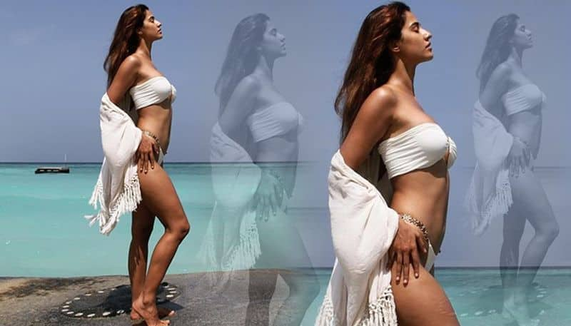 Disha Patani flaunts bikini body in white bralette drb