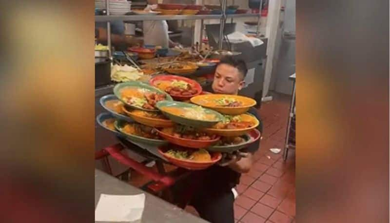 Waiter Lifts Over Dozen Plates, Internet Demands Raise For Him