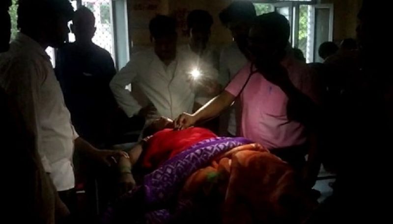 doctors treat patients using mobile torch 