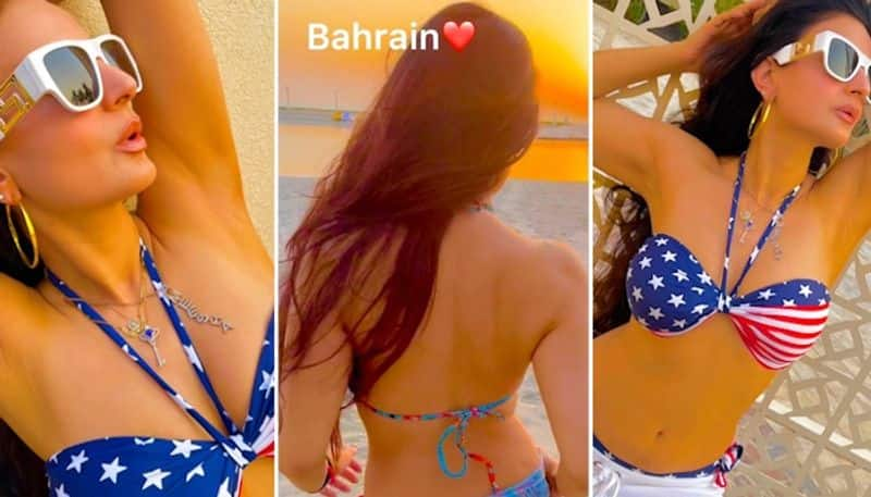 Sexy pics video Ameesha Patel goes backless on a beach in Bahrain drb