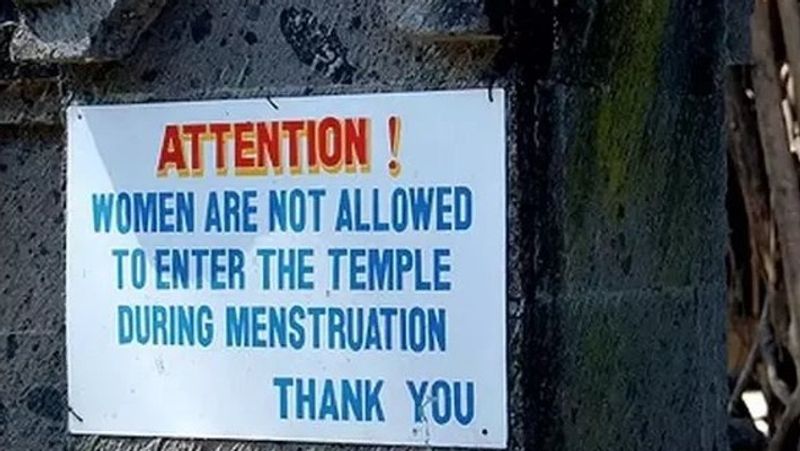 Why should women not go to temple during menstruation?