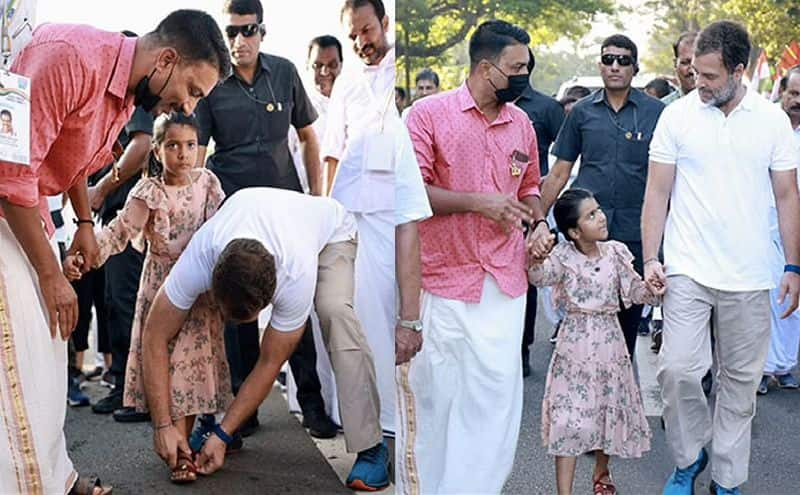 rahul gandhi helps girl to wear footwear and videos goes viral