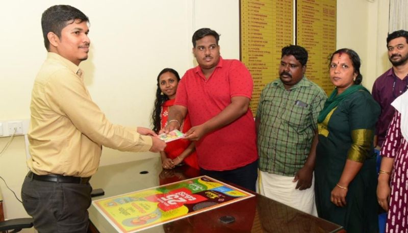 Thiruvonam bumper winner Anoop handed over 25 crore ticket to lottery department