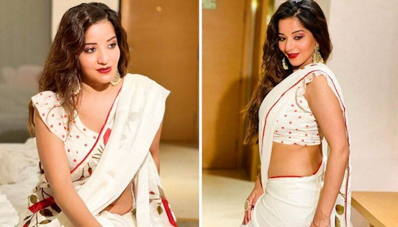 BUSTY PICTURES Bhojpuri actor Monalisa flaunts curves in floral saree drb