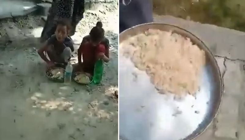 salt and rice giving as mid day meal in government school un uttar pradesh 