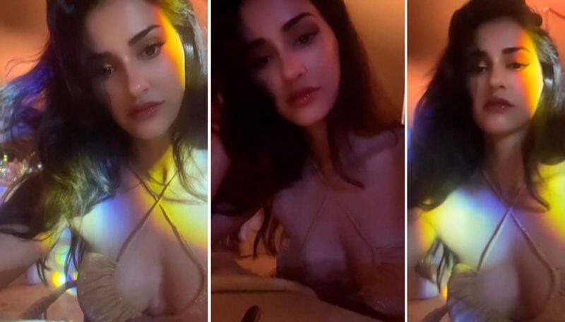 Sexy video alert Disha Patani sizzles in gold plunging neckline bralette drb