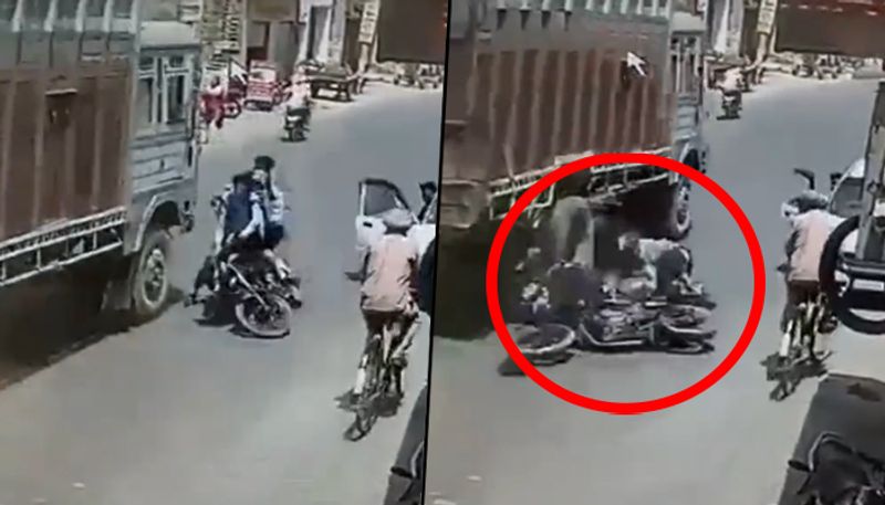 Bikers colliding into a moving truck shows why one should carefully open car's door; watch video here - gps