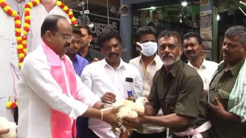 trs leader distributes free alcohol and chicken in warnagal ahead of kcrs national party launch