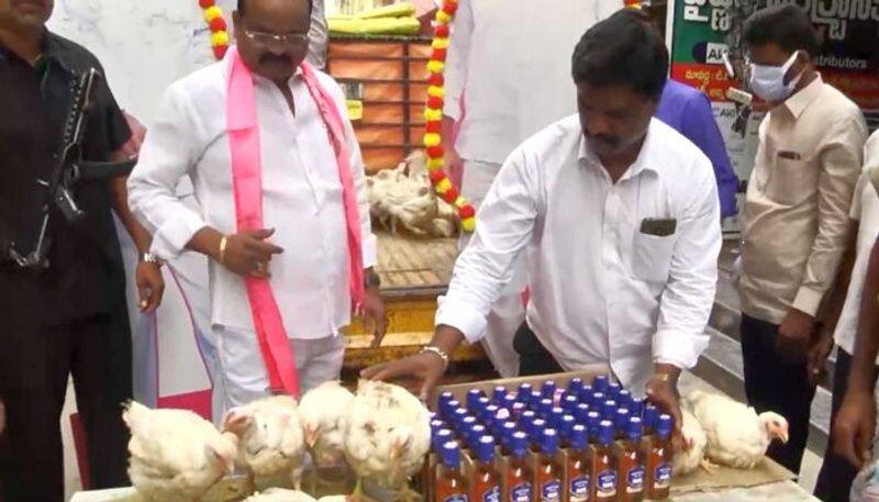 TRS leader seen distributing liquor bottles and chicken day before KCR rebrands party as national outfit