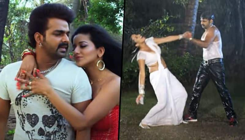 Video Bhojpuri actress Monalisa romances Pawan Singh in rain wearing SEXY white saree with deep neck blouse RBA