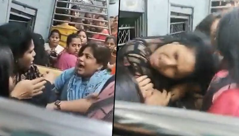 Watch Women passengers ugly fight in Mumbai local over seating arrangement; three including female cop injured - adt 