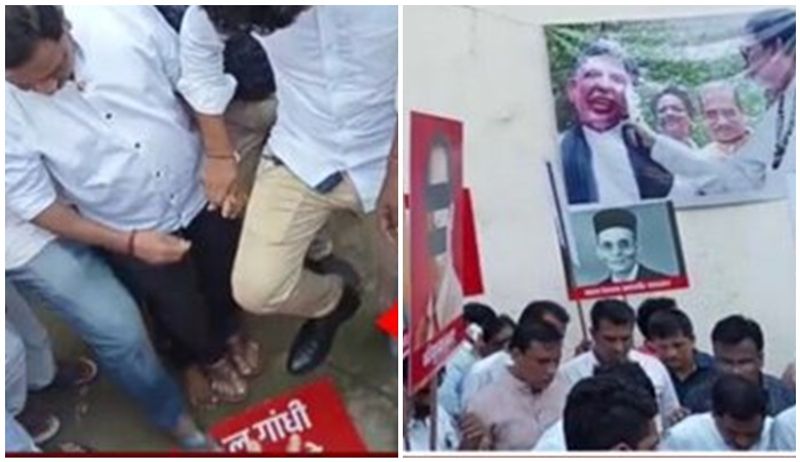 Savarkar helped British remark BJP workers hurl shoes blacken Rahul Gandhi posters san