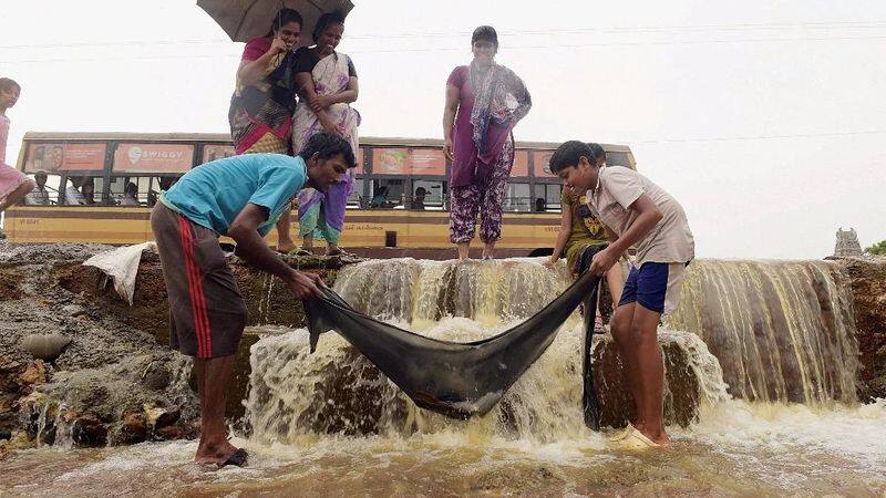 madurai people fishing in flood