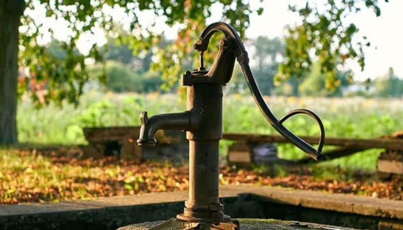 villagers sells liquor through hand pump 