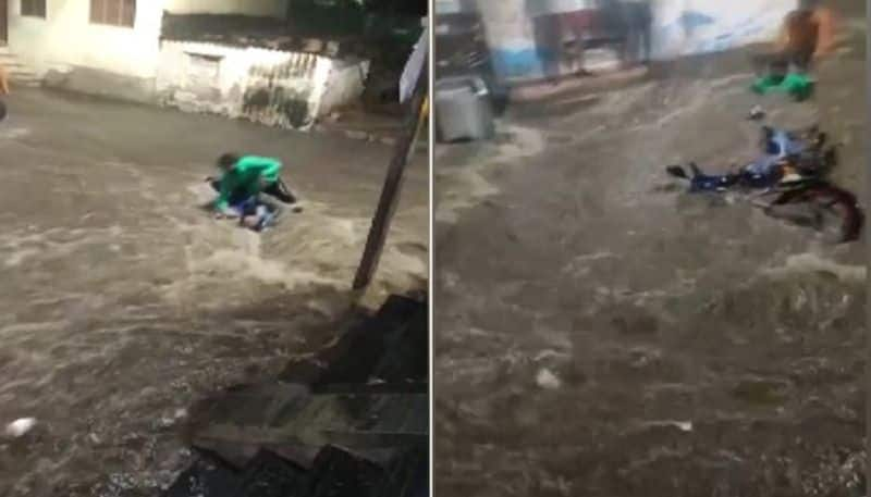 Biker Being Washed Away In Floodwater, Rescued In Hyderabad