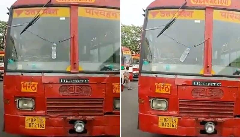 Watch UP bus driver's wiper jugaad using water bottle goes viral; Netizens react-tgy