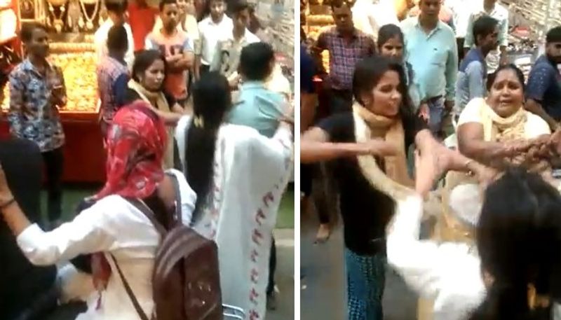 wife beats husband and girlfriend after they spotted together in street 