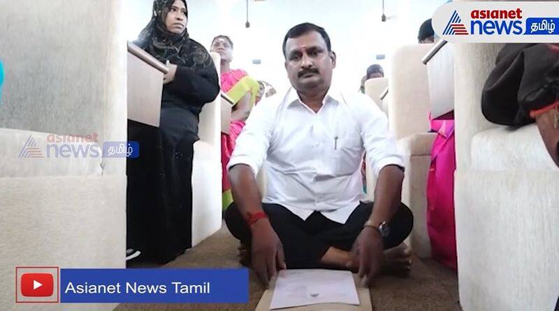 AIADMK councillor Prabhakaran protested by sitting on the floor in the Coimbatore meeting