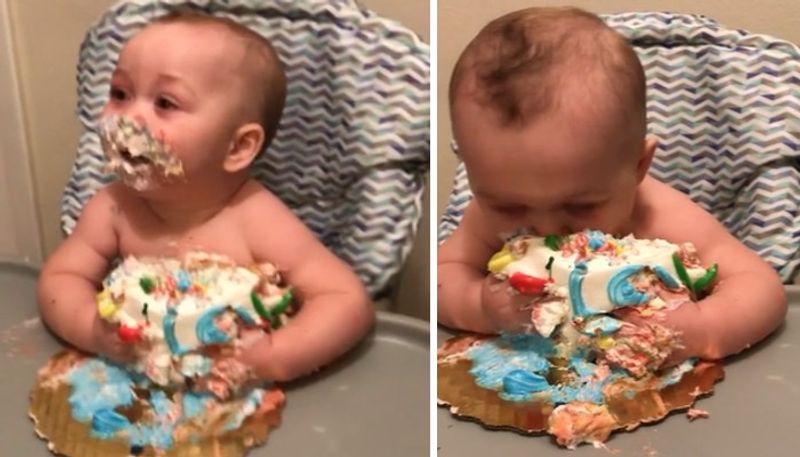 funny video in which toddler eating birthday cake 