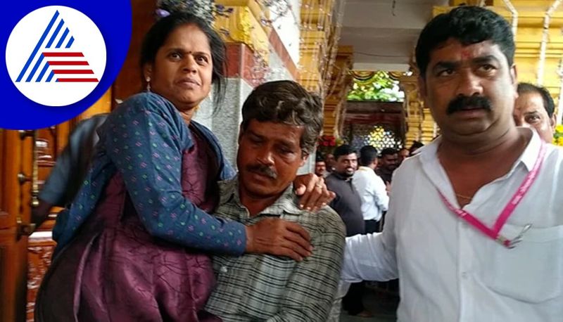 Man carries his specially abled on his shoulders for Hasanambe temple sanctum for goddess darshan gvd