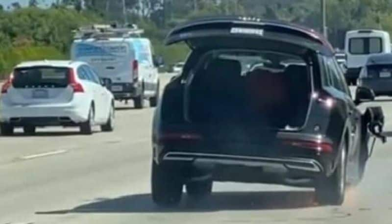 woman driving car in three tyre 