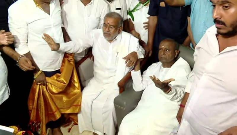 HD Deve Gowda meets GT Deve Gowda and convince him to continue with JDS