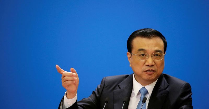 China Premier Li Keqiang was demoted in a leadership shift at the party Congress.