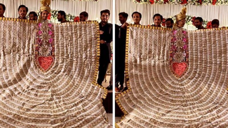 A huge cash garland for the groom with currency notes; video is going viral