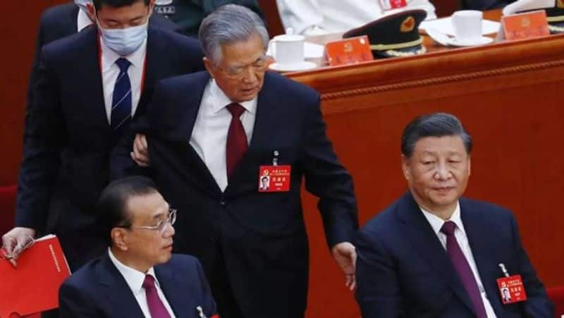 China defends decision to remove ex leader Hu Jintao from Congress