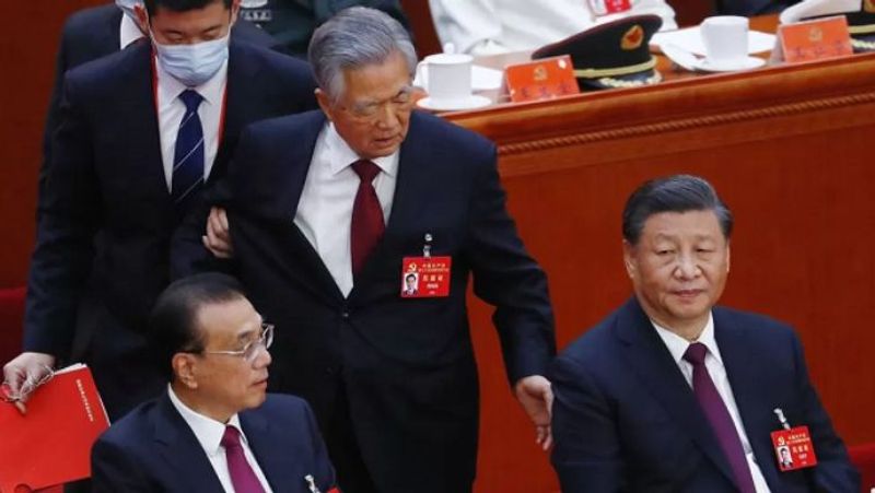 China defends decision to remove ex leader Hu Jintao from Congress