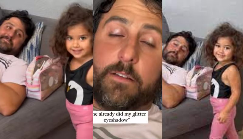 Little Girl Tries Her Make Up Skills on Daddys Face 