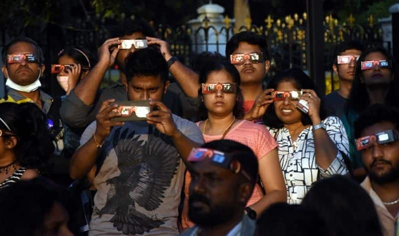 Partial solar eclipse 2022 People celebrate watching Surya Garahn in Bengaluru Images ckm