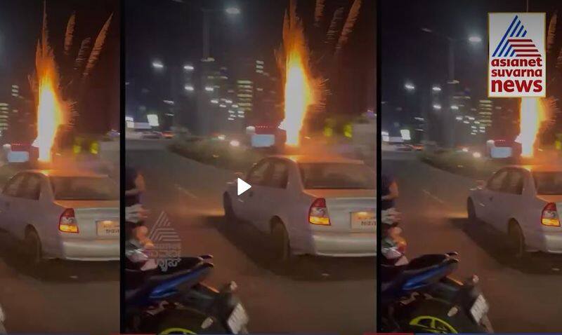 Manipal police arrest 26 year youth after viral video for Bursting Crackers on Roof of Moving Car ckm