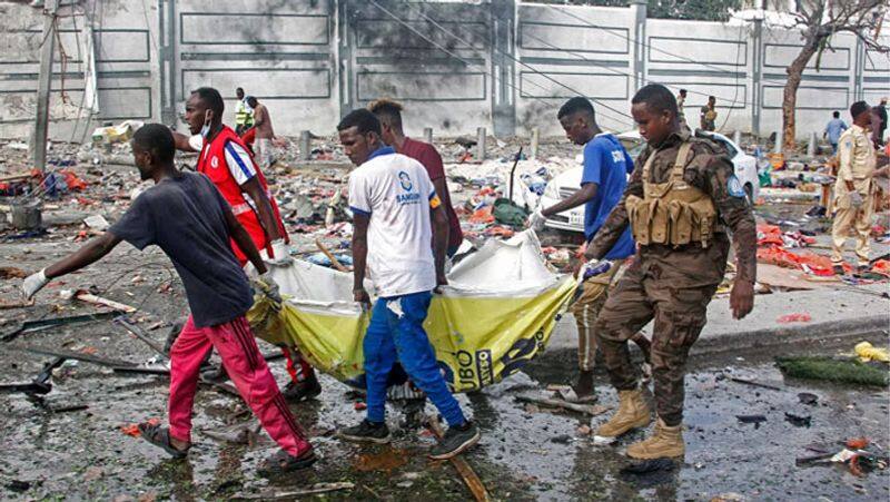 Two car bombs set off outside education ministry in Somalia 100 dead says President