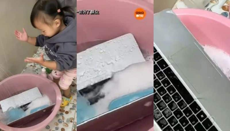 Kid Washes Fathers Laptop With Soap in viral video 