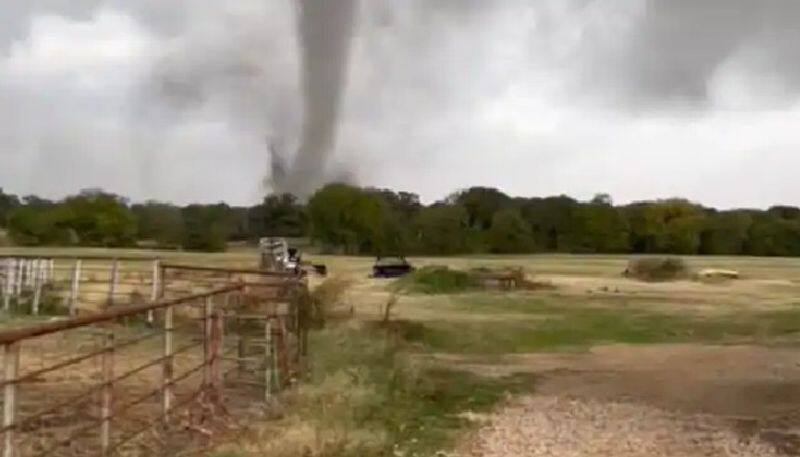 tornado destructs buildings and trees see the viral videos 