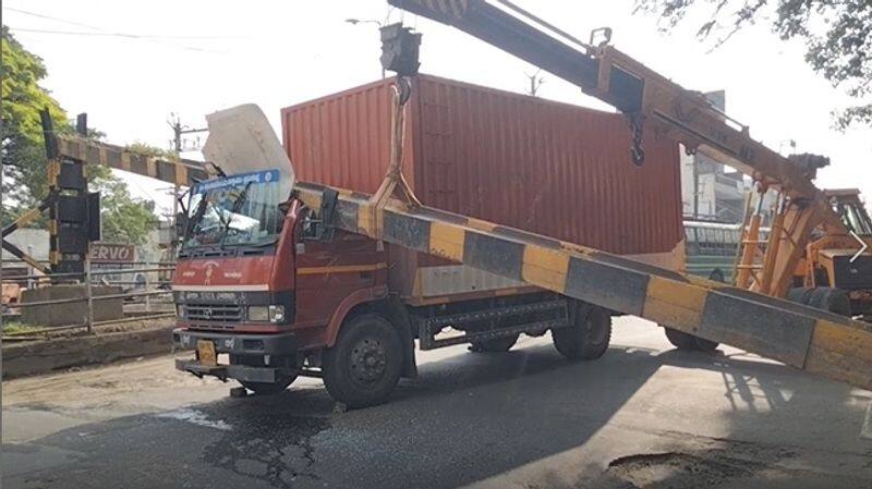 lorry crash into a height control iron pillar at coimbatore