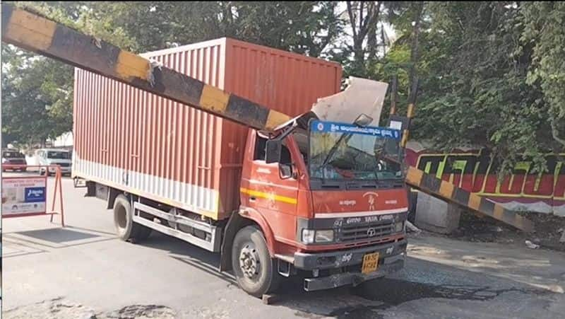 lorry crash into a height control iron pillar at coimbatore