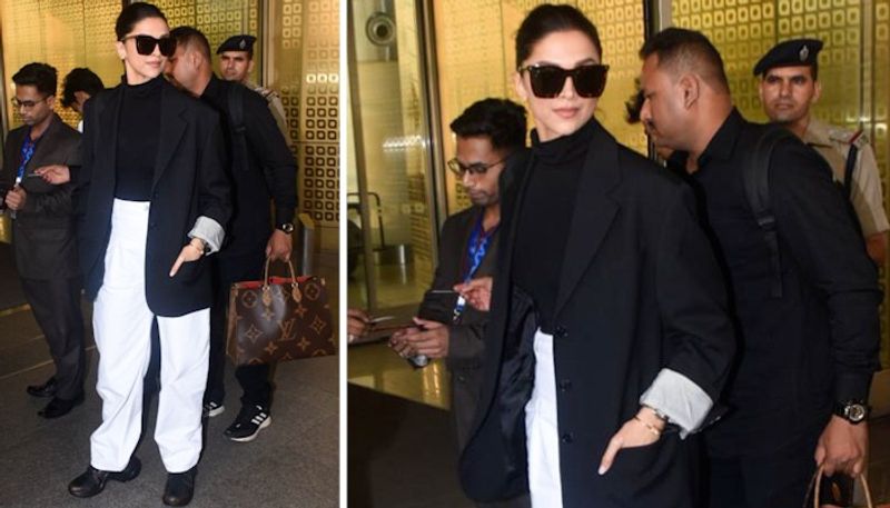 Deepika Padukone's airport look on point as she carries her infectious smile poses for cameras RBA