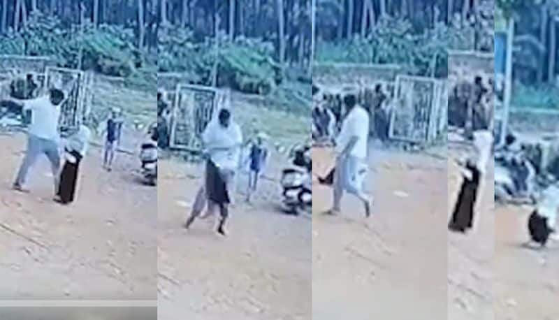 Kasaragod horrifying incident in Manjeshwara, man lifting a minor and flinging her into road, watch cctv footage akb