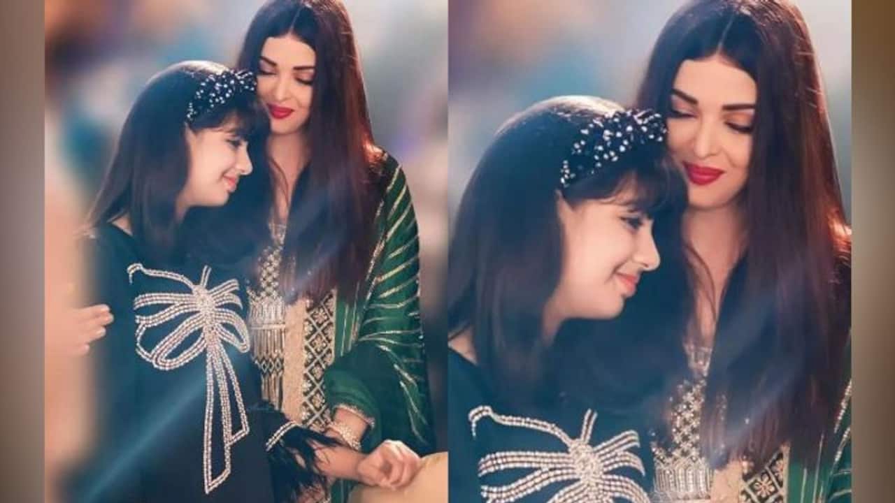 Aaradhya Bachchan birthday video: Aishwarya, Abhishek kisses their 11 year old daughter as she cuts the cake 